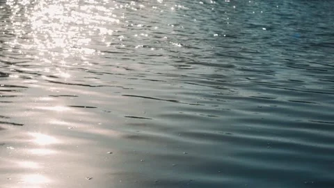 Sun glare on the water. Reflection of the sun on the water Stock Footage 132229284