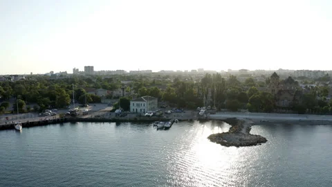 Sun glare on the water surface at the black sea embankment Stock Footage 146084547