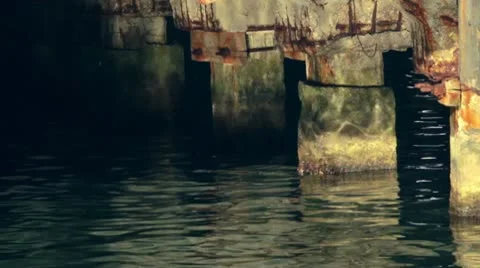 Sun glares under moorage Stock Footage 10797074