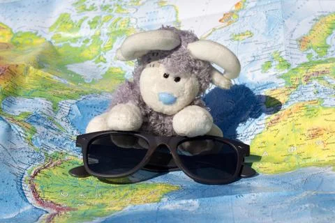 Sun glasses and map Stock Photos