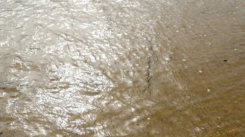 Sun glinting of rippling waves, Cornwall, UK, slow motion Stock Footage 56101658