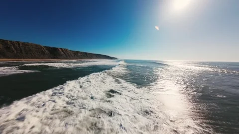 Sun glints off ocean waves Stock Footage 339803697