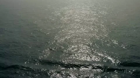 Sun Glistening on the Ocean Stock-Footage 12758934