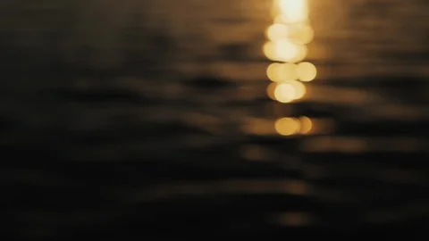 Sun glitter on waves at the amber sunset Stock Footage 119869702