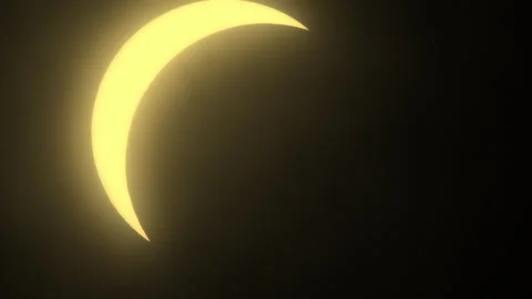 Sun Glowing Bright Behind Partial Eclipse Stock Footage 272701319