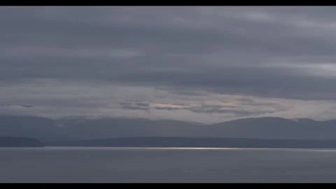 Sun glows on silvery sea Stock Footage 296517767