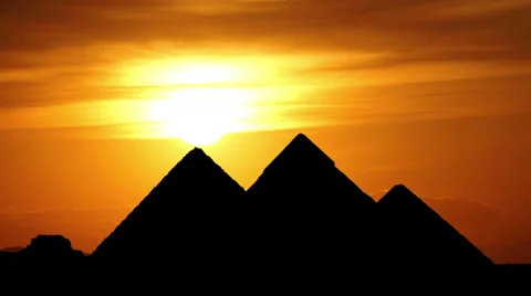 Sun goes behind great pyramids in Giza valley during gorgeous sunset, Egypt Stock Footage 38059321
