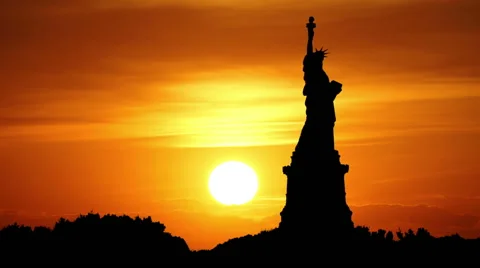 Sun goes behind Statue of Liberty, New York Stock Footage 46775271