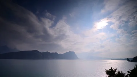 The sun goes down over the mountains and lake Lucerne. Stock Footage 112294010