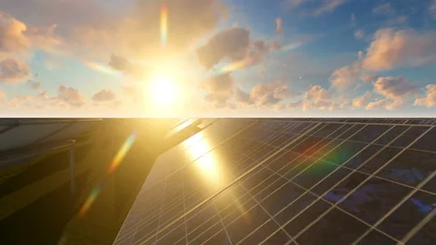 Sun goes down over solar panel field Stock Footage 152168709