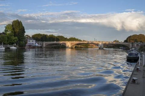 Sun going down at Hampton Court bridge Stock Photos