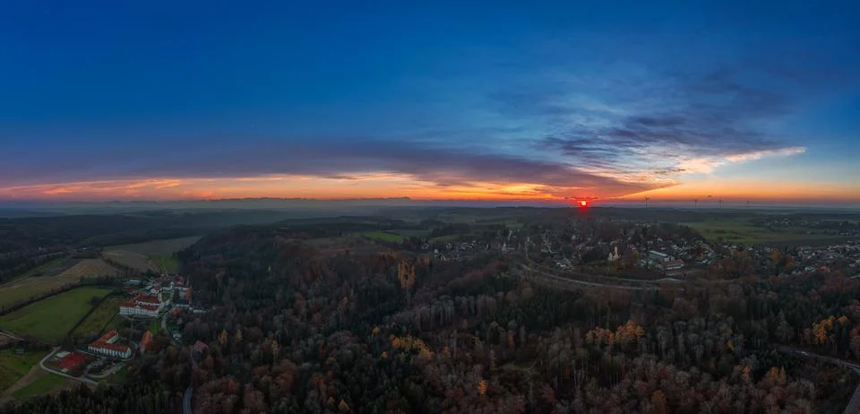 The sun is going down next the the beautiful monastery of Schaeftlarn in the Stock Photos