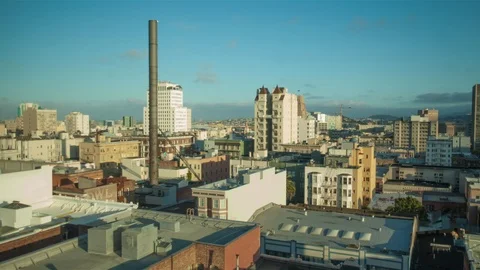 Sun going down over city rooftops 4k Stock-Footage 94006060