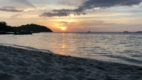 Sun is Going Down over the Ocean - Sunset on a Sunset Beach. Video stock 130404143