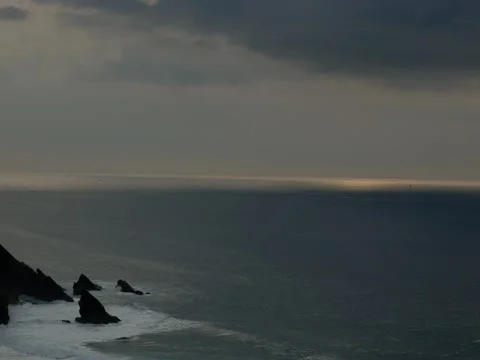 Sun going down with overhanging clouds in Sintra, Portugal Stock Footage 302505454