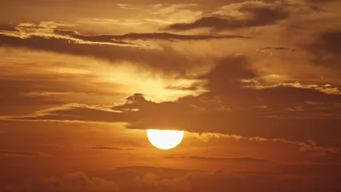 Sun going down at sunset epic sunset at hot summer golden hour evening Stock Footage 274781021