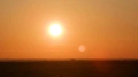 The sun is going down sunset - time lapse Stock Footage 123864206