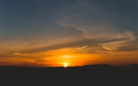 Sun is going down on a winter day Stock Photos