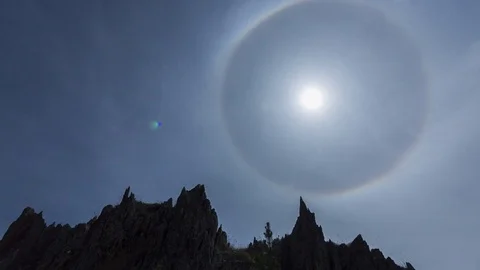 Sun halo in mountains vertical Pan Stock-Footage 84138971