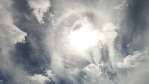 Sun halo ring n sunlight ray or sunbeam on dramatic cloudy blue sky Video stock 161151811