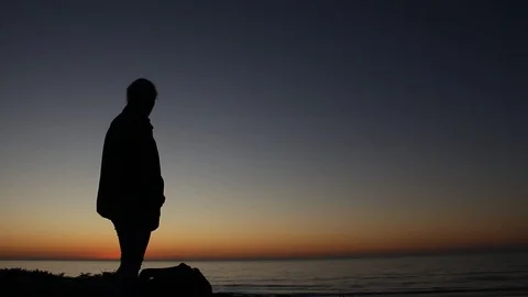 The sun has just set behind the ocean Stock Footage 123201743