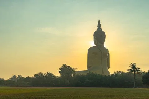 The sun on the head of big Buddha Stock Photos