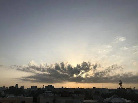 The sun hide of the dark clouds Stock Photos