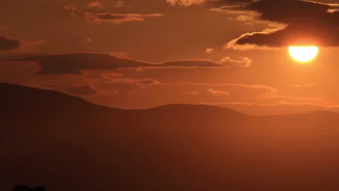 Sun hides behind the clouds in Paros island in Greece Stock-Footage 238986908