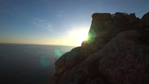 The sun that hides behind the mountains Stock Footage 98559646