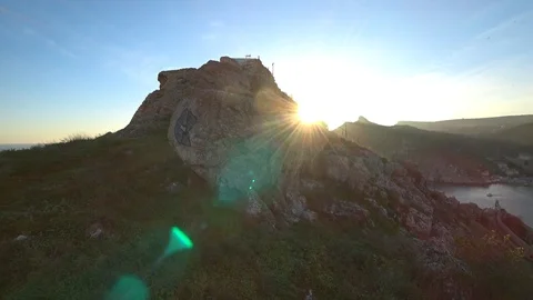 The sun that hides behind the mountains Stock Footage 98559874