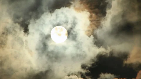 Sun hides from dark big clouds Stock Footage 34759987
