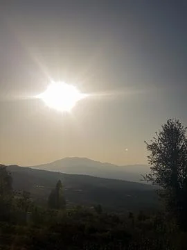 The sun hides the landscape 스톡 사진