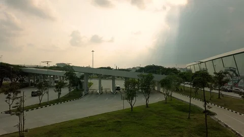 Sun Hiding Behind Cloudy Sky at Soekarno Hatta International Airport Stock Footage 108014080