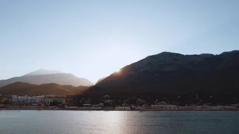 The sun is hiding behind the mountains, sunset in Kemer, Kemer mountains Stock Footage 302206146