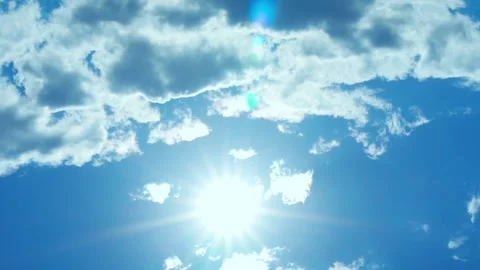 Sun Illuminates With Beams And Glare Blue Sunny Sky And White Clouds Summer Day  Stock Footage 243263318