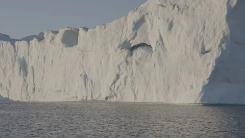 Sun Illuminating an Iceberg 2 Stock Footage 292939874