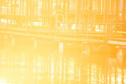 Sun light That is about to set, reflecting on the water in a beautiful golden Stock Photos