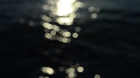 Sun light bokeh on sea wave surface, Abstract bokeh background Stock Footage 54054516