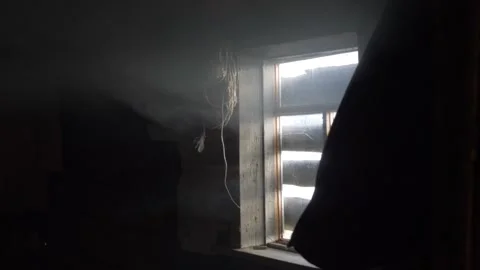 Sun light comes through boarded up window in the abandoned house. Stock Footage 269685415