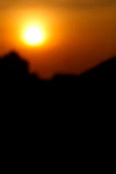 Sun light effect over village (silhouettes) Stock Photos