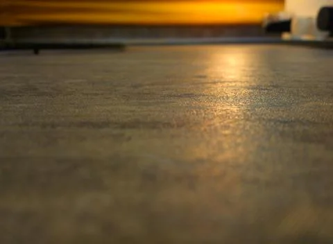 Sun light leak on low angled floor background Stock-Fotos