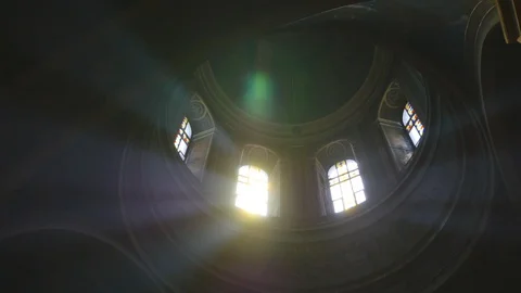 Sun light passes through the stained glass windows of the church Stock Footage 87184940