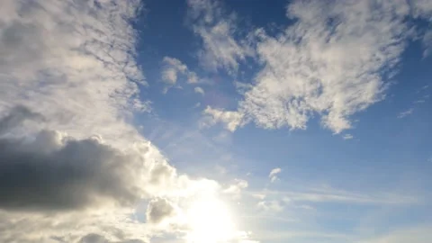 Sun light ray n bokeh sunlight or sunbeam on white cloud blue sky Stock Footage 160952388