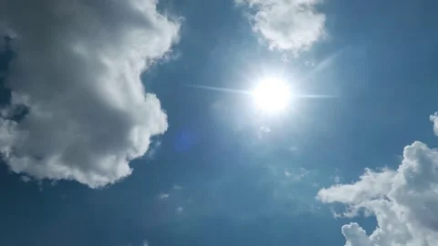 Sun light ray n sunbeam shining on blue sky with rain storm clouds Stock Footage 155053202