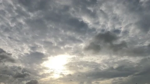 Sun light ray shining through sunrise cloud n dark rain storm cloudscape Stock Footage 160952808