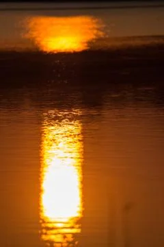Sun light reflect in the lake Stock Photos