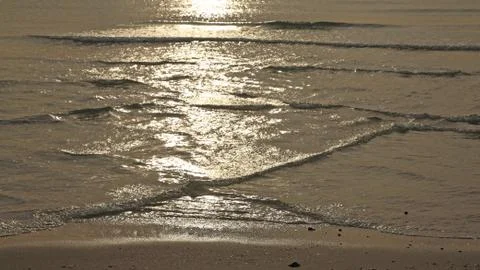 Sun light reflected on many sea  waves Stock Photos