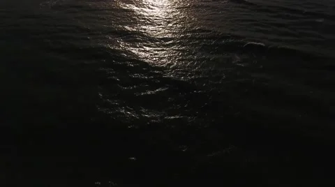 Sun light reflecting on the dark ocean. Stock Footage 68599056