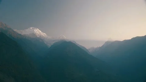 The Sun Light Shining behind mountain In The morning against the Mountain Stock Footage 154017273