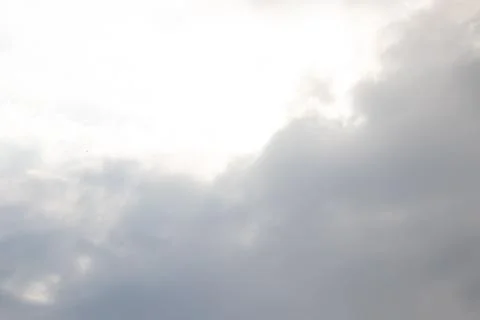 Sun Light shining through  the gaps in clouds before sun set , Crepuscular rays Stock Photos